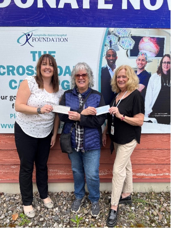 Debra Amirault donates 2 cheques