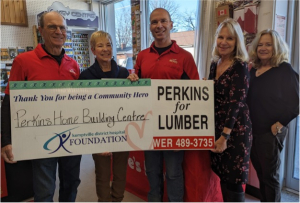 Attending the presentation of Community Hero to the Perkins family were (l-r) Lyle, Heather and Mark Perkins, Margret Norenberg, KDH Board Foundation Chair and Joanne Mavis, KDH Foundation Executive Director.