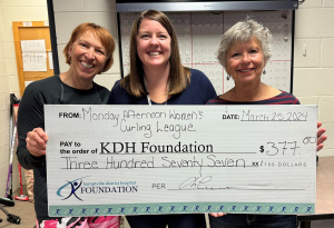Kristy Carriere, KDH Foundation Co-ordinator (middle) received a cheque for the CT Scanner Crossroads Campaign from North Grenville Monday Afternoon Women’s Curling League organizers Nancy Lebrun (left) and Christiane Charron (right).