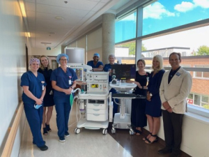 (l-r): Taylor Shelp, RN; Jennifer Ellis, Vice President, Nursing/Clinical Services and Chief Nursing Executive; Tanya Deans, RN, Manager, Clinical Programs; Dr. Colin Sentongo, Chief of Staff; Kelly Richer, RN, Surgical Care Unit Team Leader; Chelsey Green, RN, Epic Coordinator; Margret Norenberg, Foundation Board Chair; Frank Vassallo, KDH CEO